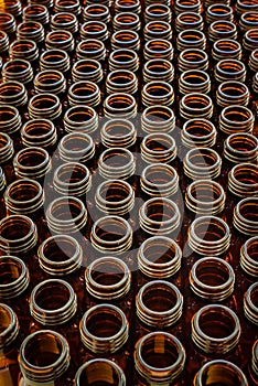 Many glass jars for empty medicines assorted in a row, chemical pharmaceutical industry concept