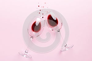 Many glasses of red wine at wine tasting. Concept of red wine on colored background. Top view, flat lay design