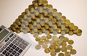 Many gold coins close up. Gold and currency reserves of the world