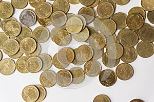 Many gold Thai baht coins on white background, Thai money, concept saving
