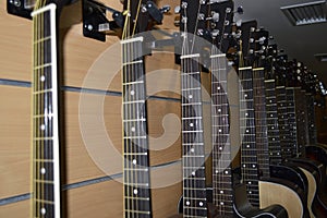 Many guitars in a row