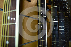Many guitars in a row