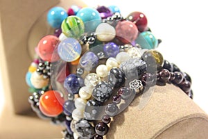 Many handmade jewelry made of semi-precious natural stones.