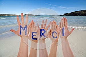 Many Hands Building Merci Means Thank You, Beach And Ocean