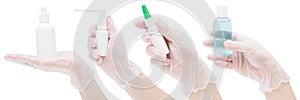 Many hands in rubber medical gloves hold various antiseptics, aerosols, sprays, isolates on a white background. Banner or site