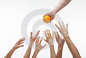 Many hands want to get orange