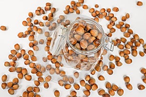 Many hazel nuts in glass bowl