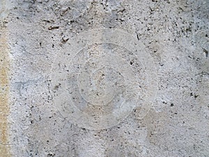 Many holes gray white wall