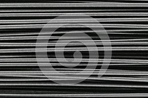 Many horizontally placed metal springs background surface
