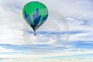 Many hot air balloons in the sky at blue sky with clouds background