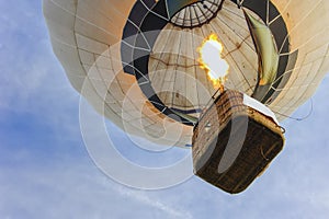 Many hot air balloons in the sky at blue sky with clouds background