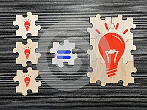 Many ideas result big idea. Light bulbs icon on jigsaw puzzle pieces.