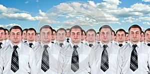 Many identical businessmen clones photo