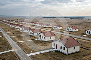 Many identical houses built with no road connection photo