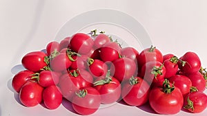 Many of juicy ripe red tomatoes