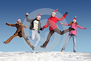 Many jumping people on snow