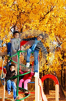 Many kids on climbing frame