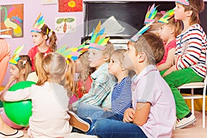 Many kids sit in developmental kindergarten class photo