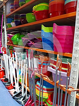 Cleaning and cooking tools on shelf