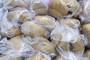 Many loafs in the cellophane bags