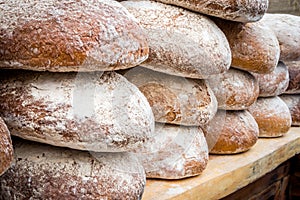 Many loaves of bread in a bakery