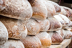Many loaves of bread in a bakery