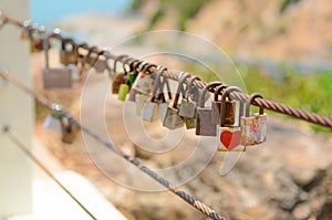 Many Love locks on fence