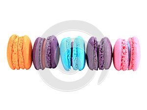 Many macarons of various colorsisolated on white background with clipping path.Selection focus