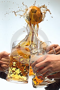 The many male hands with mugs of beer toasting on studio white background. Sport, fan, bar, pub, celebration, soccer