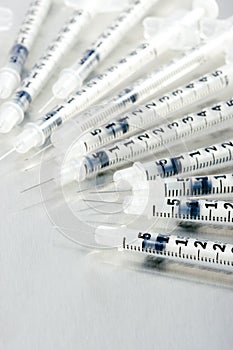 Many medical syringes