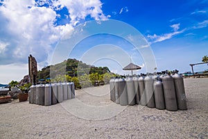 Many of Metal scuba diving oxygen tanks