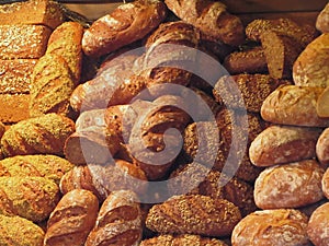 Many mixed breads and rolls background