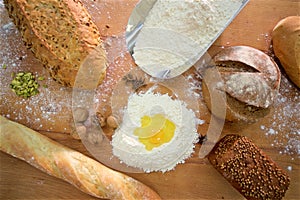 Many mixed breads on the table, shot from above