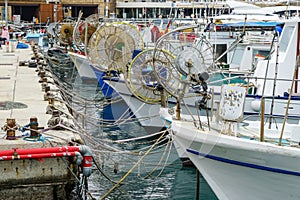 Many moored small fishing boats in the harbor of Paphos, Cyprus