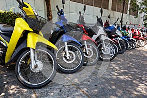 Many motorbikes at the parking