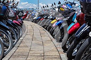 Many motorbikes at the parking