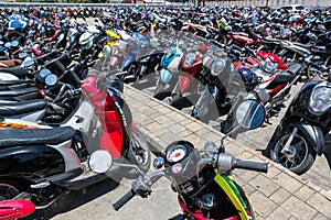 Many motorbikes at the parking