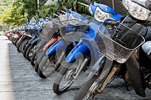 Many motorbikes at the parking