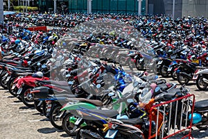 Many motorbikes at the parking photo