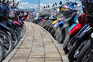 Many motorbikes at the parking photo