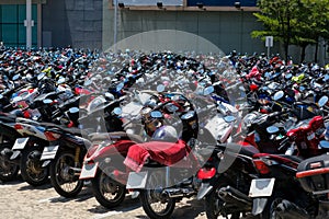 Many motorbikes at the parking photo