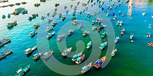 Many multi-colored, beautiful ships in the sea. view from above