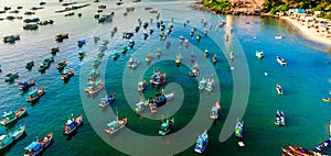 Many multi-colored, beautiful ships in the sea. view from above