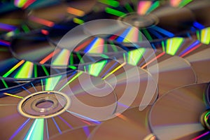 Many musical compact discs with a rainbow spectrum of colors as