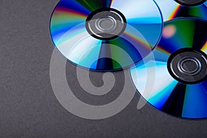 Many musical compact discs with a rainbow spectrum of colors as