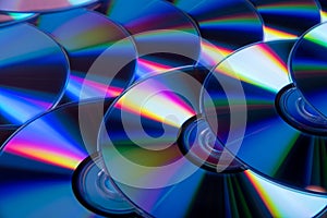 Many musical compact discs with a rainbow spectrum of colors as