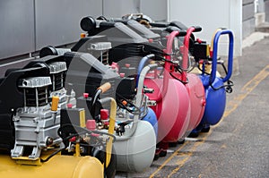 Many new air compressors pressure pumps close up