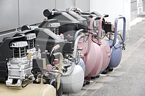 Many new air compressors pressure pumps close up