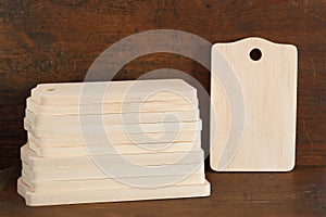 Many new cutting boards of a birch tree on antique wood background