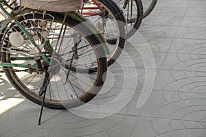 Many Old Bicycles Parked on the Sidewalk